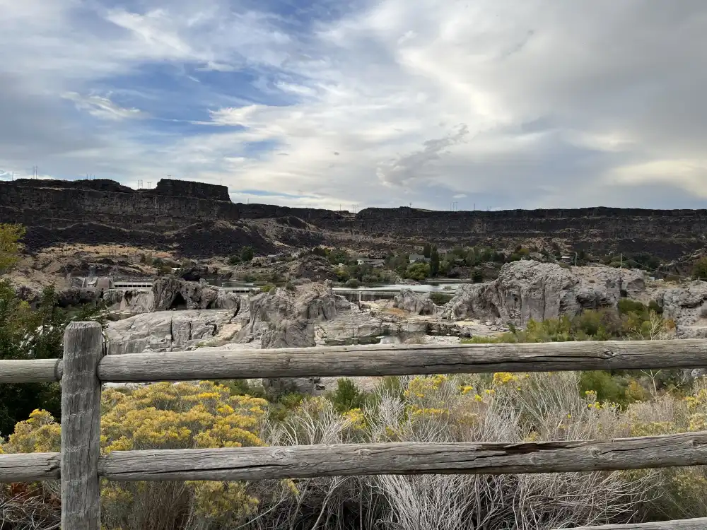 Picturesque wooden fence in front of Shoshone Falls